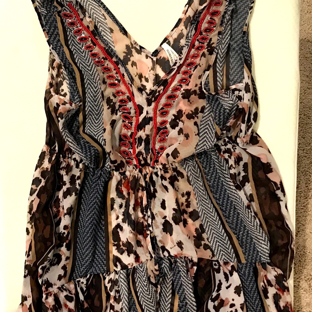 Ladies cute bathing suit cover or wear as top.